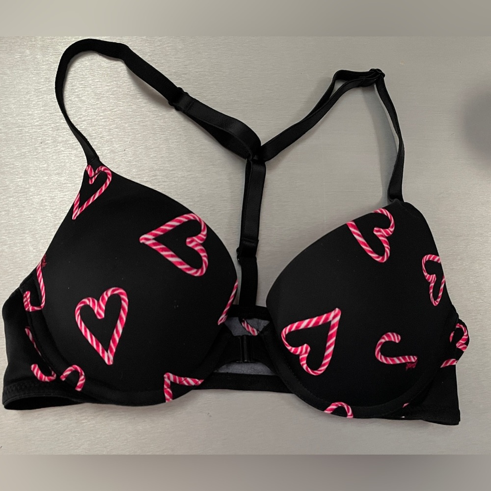 Pink Victoriaโs Secret Holiday black T back candy cane print bra
